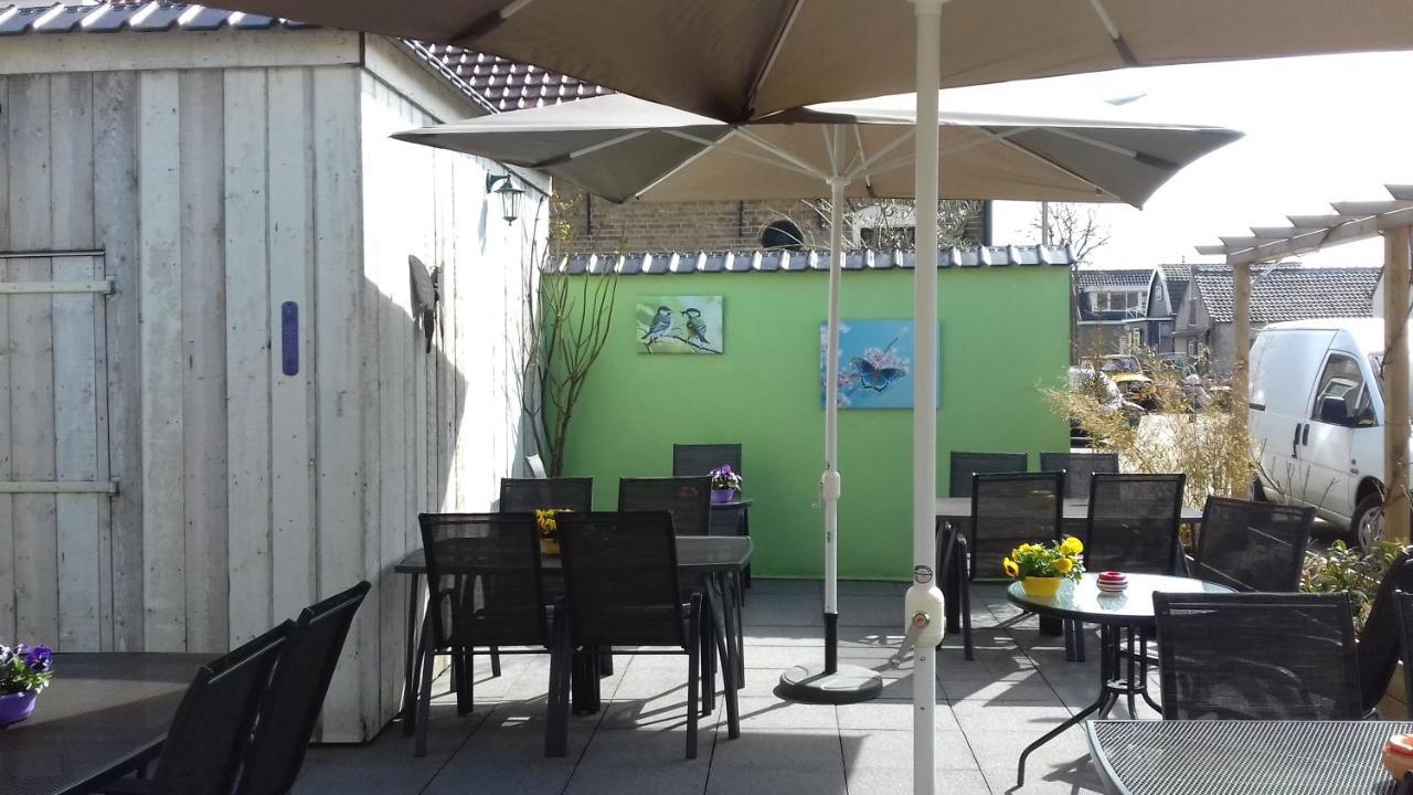 Eetcafe/Pension Nooitgedacht Strijen 外观 照片