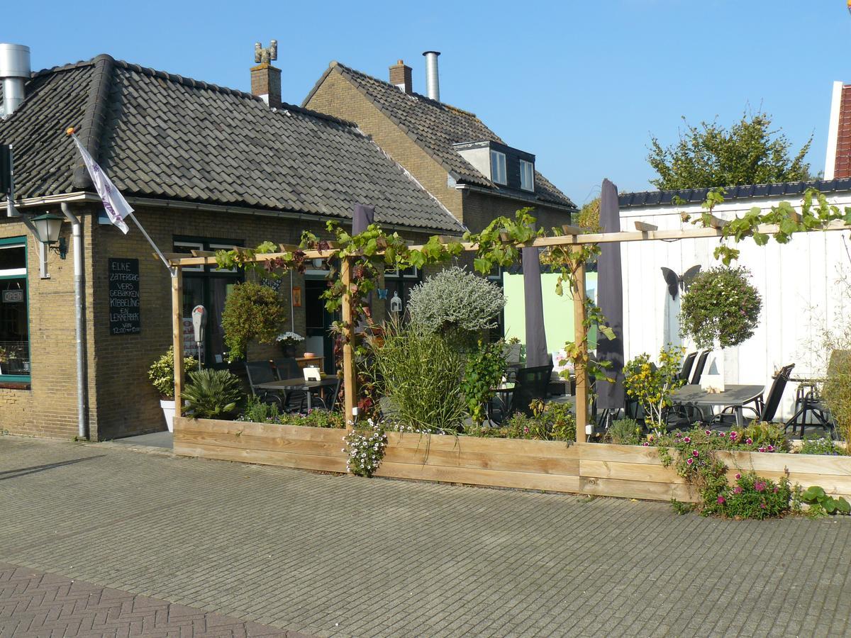 Eetcafe/Pension Nooitgedacht Strijen 外观 照片
